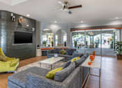 Thumbnail 20 of 32 - Relax in our clubhouse with top-notch seating and media perks at Boulders at Lookout Mountain Apartment Homes, Phoenix Arizona