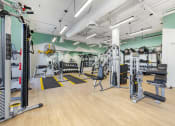 Thumbnail 11 of 45 - Full-length mirrors line the walls, allowing for perfect form checks and boosting confidence as you work toward your goals.