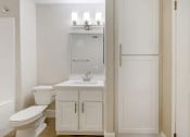 Thumbnail 24 of 29 - Each bathroom features sleek cabinetry, contemporary fixtures, and stunning tile work, creating a spa-like atmosphere.