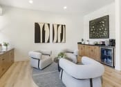 Thumbnail 34 of 45 - Our leasing office offers a cozy retreat with complimentary coffee and refreshing cool water, inviting you to relax and explore your new home sweet home.at The Michael B Townhomes and Flats, Las Vegas