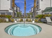 Thumbnail 5 of 45 - The Michael B's luxury apartment complex boasts a tranquil jacuzzi retreat, surrounded by lush palm trees and sleek architectural marvels. Dive into serenity amidst the cityscape.at The Michael B Town