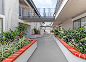 Thumbnail 26 of 28 - Wander through the verdant corridors of Independence Plaza, where every step is a breath of fresh air amidst urban living.