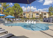Thumbnail 3 of 29 - With sparkling water, new lounge chairs, and enhanced landscaping, our pool area is the perfect place to soak up the sun, unwind, and enjoy a refreshing swim.