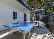 Thumbnail 6 of 28 - Ping Pong Table is offered near the covered area with foosball.at Sage Creek Apartment Homes, Simi Valley, 93063