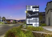 Thumbnail 45 of 45 - As the sun sets and the skies turn to hues of twilight, The Michael B welcomes all who pass by with its glowing lighted sign along the street.