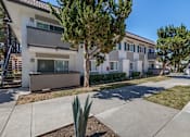Thumbnail 27 of 28 - Freshly renovated exterior with delightful landscaping.