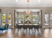 Thumbnail 35 of 50 - The clubhouse features large tables ideal for gatherings, whether you're hosting a small get-together, working on a project, or enjoying a meal with friends at Ascent at the Galleria.