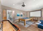 Thumbnail 25 of 50 - The clubhouse offers a variety of amenities, including a rec room with a pool table, TV, and shuffleboard—perfect for relaxing and socializing at Ascent at the Galleria.
