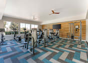 Thumbnail 22 of 50 - Our state-of-the-art fitness center features a variety of cardio machines, weight equipment, and free weights—everything you need for a full, convenient workout at Ascent at the Galleria.