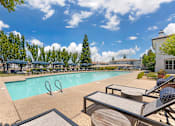 Thumbnail 1 of 50 - Dive into pure relaxation at Ascent at the Galleria’s pool deck in Rosevilla, CA—adorable cabanas and plush lounge chairs surround a sparkling pool, offering serene and stylish outdoor lounging vibes.