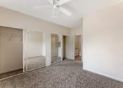 Thumbnail 19 of 50 - Bedrooms at Ascent at the Galleria come with cozy carpeting and ceiling fans, providing comfort and a relaxing atmosphere in every home.