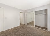 Thumbnail 16 of 21 - Sedona Apartments in Moreno Valley offers renovated units with updated bedrooms, plush carpet, and a primary bedroom featuring a private bathroom.