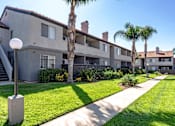 Thumbnail 19 of 21 - Sedona Apartments in Moreno Valley features freshly painted exteriors and beautifully manicured lawns, offering a vibrant, well-kept community to call home.