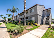 Thumbnail 18 of 21 - Sedona Apartments in Moreno Valley feature freshly painted exteriors and beautifully manicured lawns for a vibrant, welcoming community.