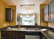Thumbnail 1 of 28 - Chef inspired kitchen islands with chic pendant lighting at Crooked Oak at Loma Verde Preserve, Novato, 94949