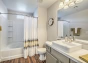 Thumbnail 28 of 45 - Indulge in luxury at The Michael B: where every detail, from the sleek fixtures to the spa-like bathtub, transforms your daily routine into a tranquil escape.at The Michael B Townhomes and Flats, Las 