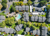 Thumbnail 20 of 28 - an aerial view of houses in a suburban neighborhood