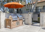Thumbnail 30 of 48 - our apartments showcase an outdoor kitchen at La Serena, San Diego, California