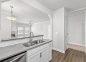 Thumbnail 13 of 41 - Breakfast bar looking into living room with extra counterspace