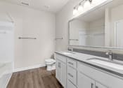 Thumbnail 18 of 41 - Master Bathroom with Double Sinks and Large Mirror