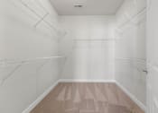 Thumbnail 17 of 41 - a spacious walk in closet offers lots of room for extra storage