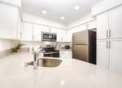 Thumbnail 8 of 39 - upgraded kitchen, quartz, new appliances at Bella Vista, Mission Viejo, CA, 92691