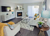 Thumbnail 15 of 26 - large living room with fireplace and patio at Club Pacifica, Benicia, CA