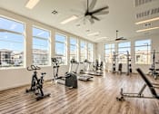 Thumbnail 14 of 17 - Gym with cardio equipment and a large window at Hampton Meridian, Apache Junction