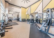Thumbnail 22 of 24 - Fitness Center With Modern Equipment at Link Apartments® West End, Greenville, SC, 29601