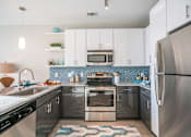 Thumbnail 5 of 24 - Fully Equipped Kitchen  at Link Apartments® Glenwood South, Raleigh, 27603