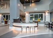 Thumbnail 23 of 24 - Eat-In Table With High Chairs In Clubhouse at Link Apartments® Glenwood South, Raleigh, NC, 27603
