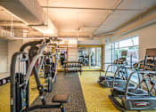 Thumbnail 19 of 24 - Cardio Studio Equipment at Link Apartments® Glenwood South, North Carolina