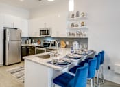 Thumbnail 3 of 29 - Model kitchen at Link Apartments® Grant Park, Georgia