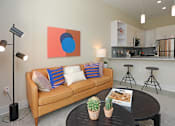 Thumbnail 3 of 44 - Living Room With Kitchen View at Link Apartments Innovation Quarter, Winston Salem, North Carolina