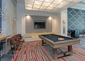 Thumbnail 19 of 44 - Billiards Table In Clubhouse at Link Apartments Innovation Quarter, Winston Salem, NC, 27101