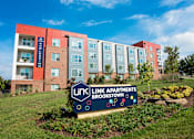 Thumbnail 1 of 28 - Property Signage at Link Apartments® Brookstown, Winston Salem, NC