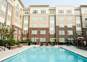 Thumbnail 11 of 21 - Pool With Sunning Deck at Link Apartments® Manchester, Richmond, Virginia