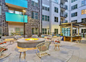 Thumbnail 16 of 48 - Outdoor Fireplace Loungeat Link Apartments® Montford, Charlotte, NC, 28209