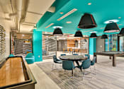 Thumbnail 21 of 48 - Game Room With Shuffle Board at Link Apartments® Montford, Charlotte, NC, 28209