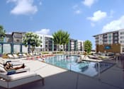 Thumbnail 5 of 18 - A pool area with lounge chairs and a person standing by the pool.