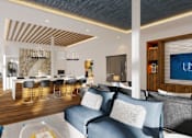 Thumbnail 12 of 18 - A modern living room with a blue sofa and a wooden floor.