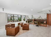 Thumbnail 21 of 22 - Resident lounge with comfortable seating areas at Link ® Lake Park Apartments, Georgia
