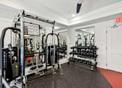 Thumbnail 23 of 28 - the gym is equipped with weights and cardio equipment at Link Apartments® Brookstown, Winston Salem, 27101