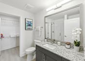 Thumbnail 6 of 32 - a bathroom with a large mirror and a toilet and a sink  at Link Apartments® H Street, Washington, 20002