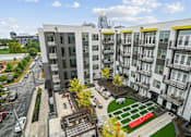 Thumbnail 19 of 25 - an aerial view of an apartment complex with a green courtyard at Link Apartments® Mint Street, Charlotte, NC, 28203