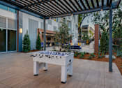 Thumbnail 16 of 25 - foosball table in the courtyard of Ladera