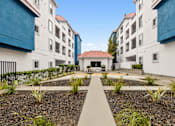 Thumbnail 19 of 22 - Exterior Views at Del Norte Place Apartment Homes
