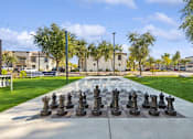Thumbnail 23 of 24 - Life size chess at Biscayne Bay Apartments