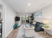 Thumbnail 6 of 24 - comfortable living room at Pointe Luxe Apartment Homes, San Diego, CA, 92110