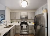 Thumbnail 3 of 15 - Modern Kitchen at Pine at 6th